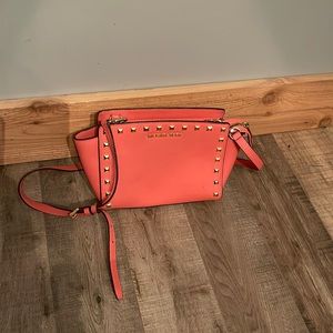 Michael Kors coral with gold studded accents purse 9” W x 7” H x 5-6” D